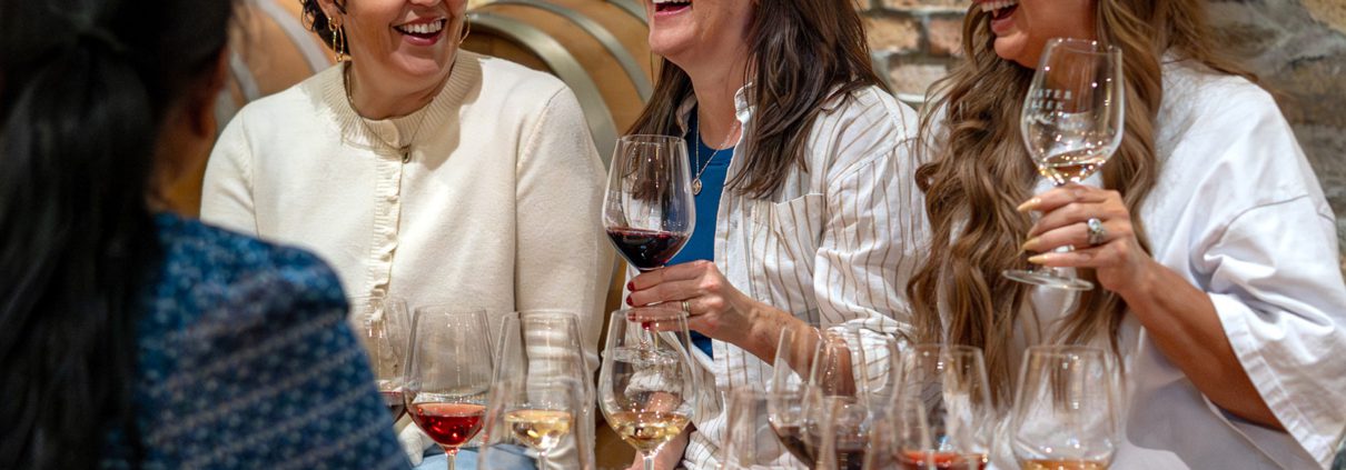 Guests in Bench Club Lounge drinking wine