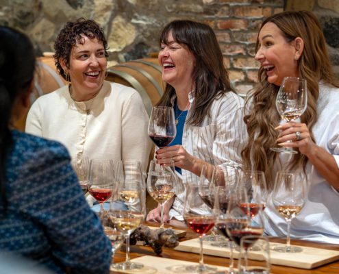 Guests in Bench Club Lounge drinking wine