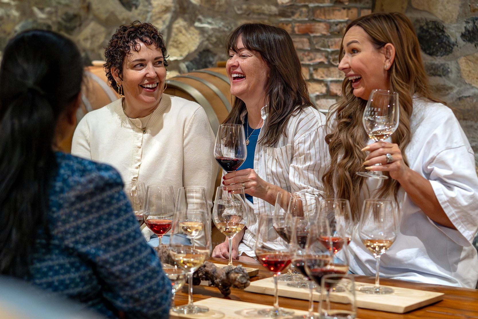 Guests in Bench Club Lounge drinking wine